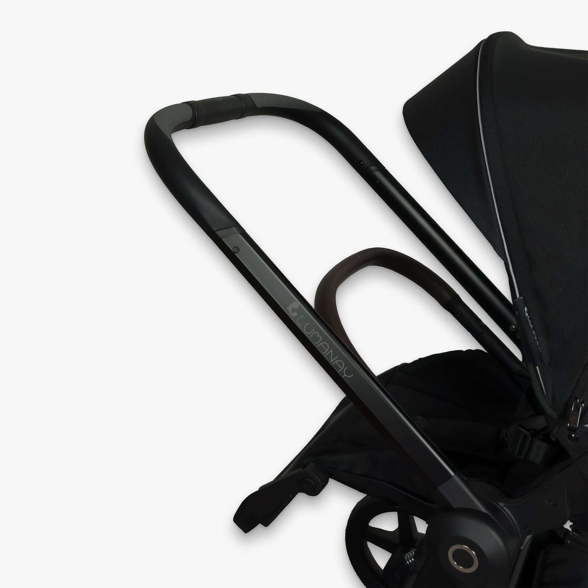 Detail view of the deep-black frame and push handle